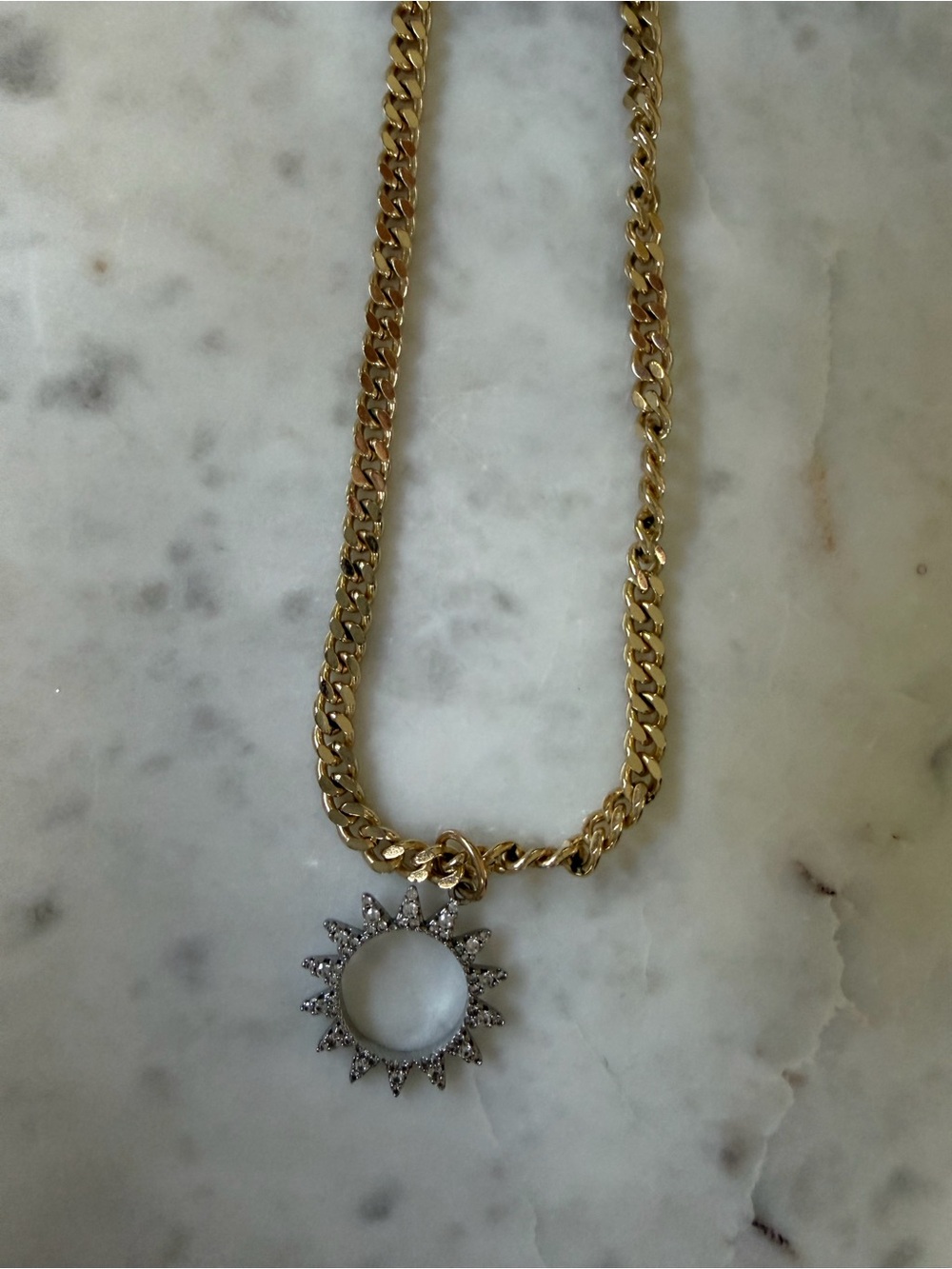 Farrah b Gold chain with silver tone Sunburst Pendant